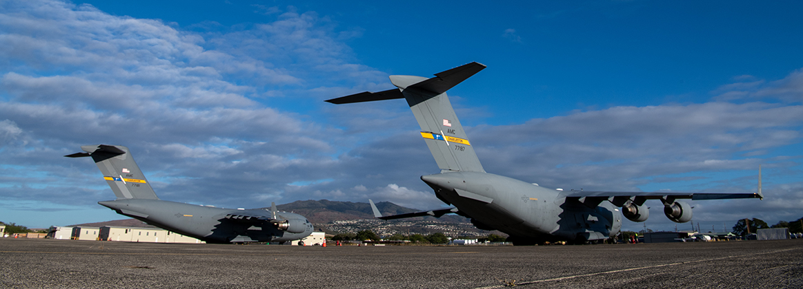 C-17 Globemaster III's wait to take off at Joint Base Pearl Harbor-Hickham